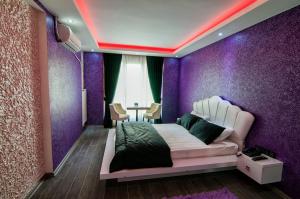 En eller flere senge i et værelse på AG Hotel & Residence Şişli