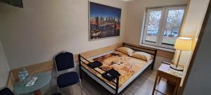 Postel nebo postele na pokoji v ubytování Hostel CENTRUM