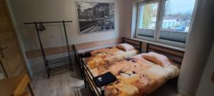 Postel nebo postele na pokoji v ubytování Hostel CENTRUM