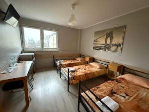 Postel nebo postele na pokoji v ubytování Hostel CENTRUM