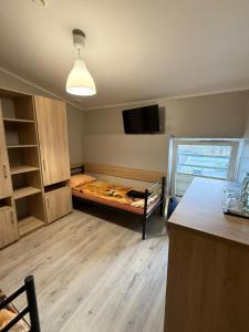 Postel nebo postele na pokoji v ubytování Hostel CENTRUM