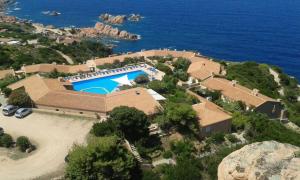 an aerial view of a house with a swimming pool at Villa K1- INFINITYHOLIDAYS in Costa Paradiso