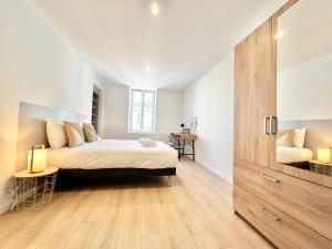 Postel nebo postele na pokoji v ubytování Le Reflet Doré - Familial - Spacieux - Central