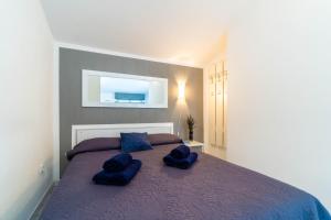 Postel nebo postele na pokoji v ubytování Apartments Percan