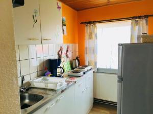 Kuchyň nebo kuchyňský kout v ubytování Ferienwohnung Nettelbeck