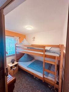 Postel nebo postele na pokoji v ubytování Ferienwohnung Nettelbeck