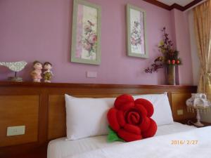 Letto o letti in una camera di Flower Bird House B&B