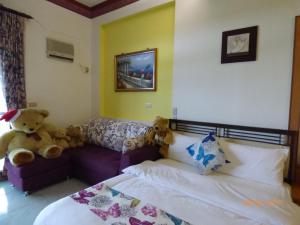 Letto o letti in una camera di Flower Bird House B&B