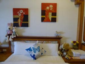 Letto o letti in una camera di Flower Bird House B&B