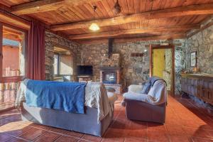 Posezení v ubytování El Mirador de Babia