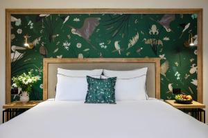 Postel nebo postele na pokoji v ubytování Galilion Hotel + 36 fotografií
