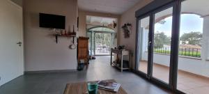 TV a/nebo společenská místnost v ubytování La casita