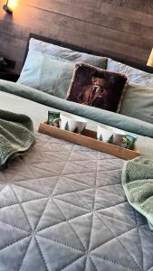 a close up of a bed with a mattress at Апартамент - Боровец Хотел ''Боровец Гардънс'' A 44 in Borovets
