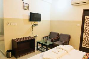 TV a/nebo společenská místnost v ubytování Hotel Comfort Inn