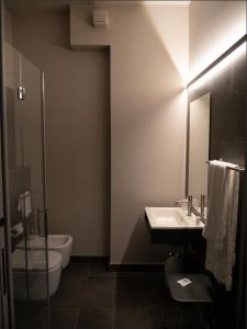 Koupelna v ubytování Aldero Hotel
