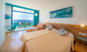 Postel nebo postele na pokoji v ubytování Hotel Blaucel