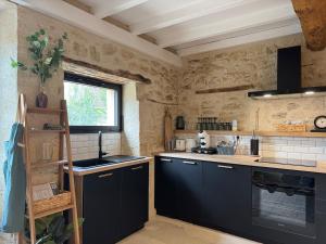 Η κουζίνα ή μικρή κουζίνα στο La Maisonnette d'Émilion