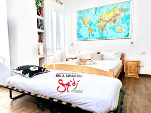Rúm í herbergi á B&b Sà Di..