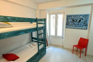 Posteľ alebo postele v izbe v ubytovaní White Rabbit Hostel