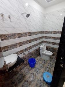 Koupelna v ubytování Hotel Kanchan