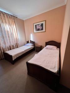 Postel nebo postele na pokoji v ubytování Amare