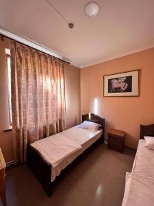 Postel nebo postele na pokoji v ubytování Amare