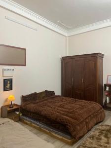 Postel nebo postele na pokoji v ubytování Cozy Fam Homestay Hanoi