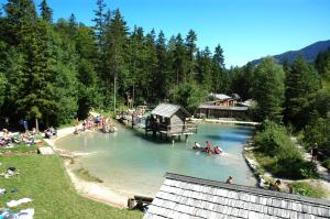 a group of people in the water at a resort at Gasthof Post in Sankt Gallen