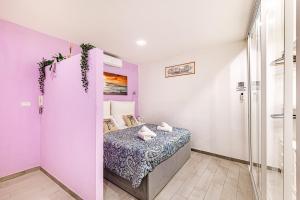 Postel nebo postele na pokoji v ubytování Deluxe Apartments Pantheon