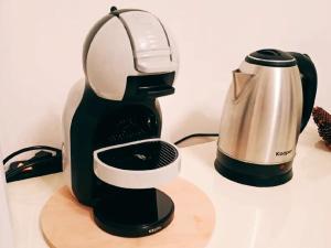 a black mixer sitting on top of a counter at Trastevere’s Flower in Trastevere