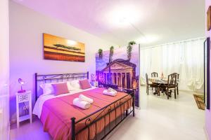 Postel nebo postele na pokoji v ubytování Deluxe Apartments Pantheon