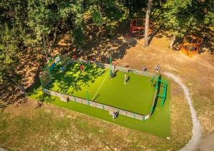 an overhead view of a park with a playground at ZEcamping chiens acceptés espace aquatique et bar in La Baule