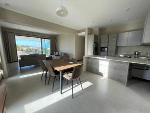 Kuchyň nebo kuchyňský kout v ubytování Superbe appartement haut de gamme avec piscine Roof top vue mer