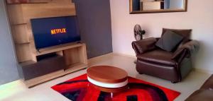 Posezení v ubytování Macb Estate - Apartments in Chililabombwe