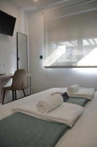 Postel nebo postele na pokoji v ubytování Alma Candida 14