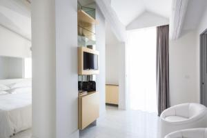 Postel nebo postele na pokoji v ubytování Senato Hotel Milano