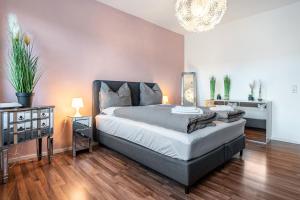 Ένα ή περισσότερα κρεβάτια σε δωμάτιο στο Wohnung am Hagener Hauptbahnhof