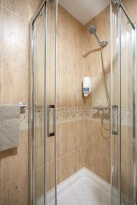 Ένα μπάνιο στο Apartamentos Capricho del Mar