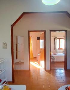 Postel nebo postele na pokoji v ubytování Elia House