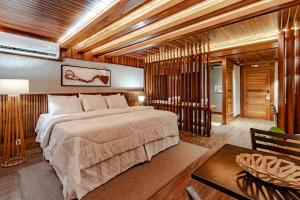 a bedroom with a large bed in a room at Uiara Amazon Resort in Manaus +103 photos