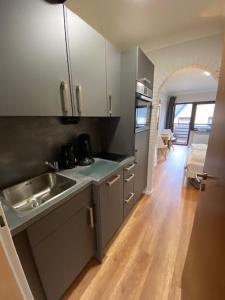 Kuchyň nebo kuchyňský kout v ubytování Haus Schwanensee Wohnung 24 + 4 fotografie