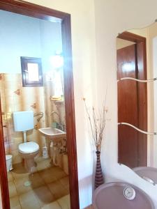 Koupelna v ubytování Elia House