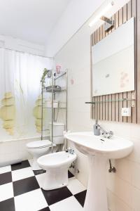 Ένα μπάνιο στο Acogedor apartamento céntrico.