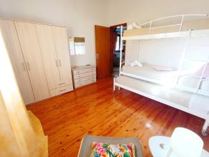 Postel nebo postele na pokoji v ubytování Elia House