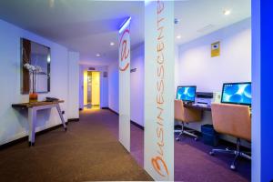 an office with two desks and two computers at MB Boutique Hotel - Adults Recommended in Nerja