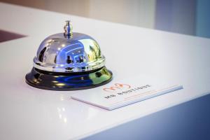 a trophy sitting on top of a white table at MB Boutique Hotel - Adults Recommended in Nerja