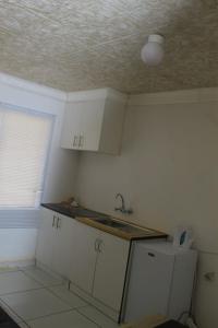 Kuchyň nebo kuchyňský kout v ubytování Bara Guesthouse