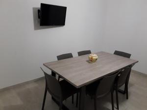 Televiisor ja/või meelelahutuskeskus majutusasutuses Casa mare Torre Pali Salento
