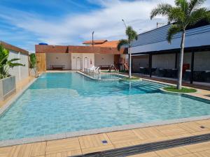 Swimmingpoolen hos eller tæt på Apto no Farol Velho - Salinópolis PA