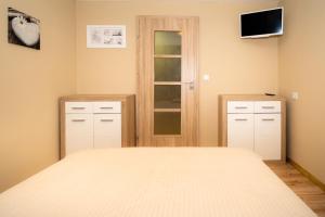 Voodi või voodid majutusasutuse Apartmány Brychovi toas